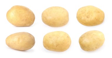 Beyazlar üzerinde taze çiğ patates.