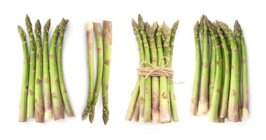 Taze yeşil kuşkonmaz beyaza izole edilmiş.