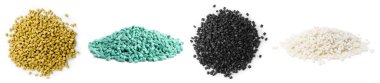 Farklı renklerde plastik granüller. Beyaz arkaplanda yığınlar, ayarla