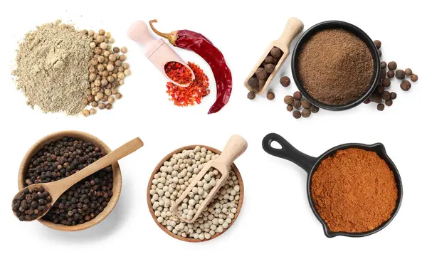 Farklı biber türleri, set. Beyaz üzerine izole baharatlar, üst görünüm