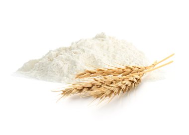 Beyaz arka planda buğday unu ve dikenler