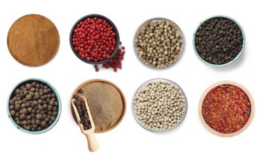 Farklı biber türleri, set. Beyaz üzerine izole baharatlar, üst görünüm