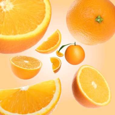 Altın arka planda taze portakallar uçuşuyor. Citrus meyvesi.