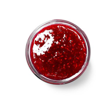 Cam kavanozda tatlı ahududu reçeli.