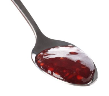 Beyaz kaşık içinde tatlı ahududu reçeli