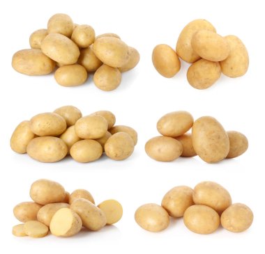 Beyazlar üzerinde taze çiğ patates.