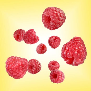 Taze ahududu, sarı arkaplanda dalgalanır.