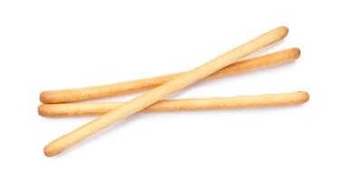 Lezzetli Grissini çubukları beyaza izole edilmiş, üst manzara