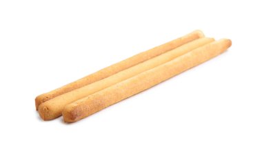 Üç lezzetli Grissini çubuğu beyaza izole edilmiş