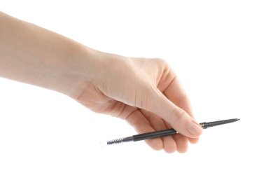 Beyaz arka planda kaş kalemi olan kadın, yakın plan.