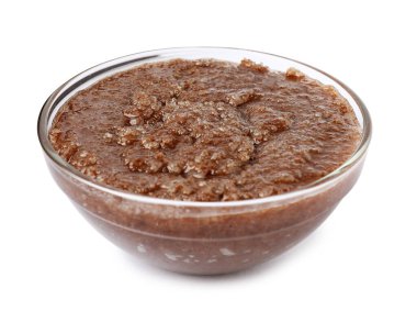 Beyaza izole edilmiş cam kasede doğal vücut fırçası.