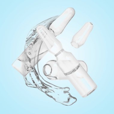 Açık mavi arkaplana karşı havada ampul ve sıçrama tıbbi veya kozmetik sıvı