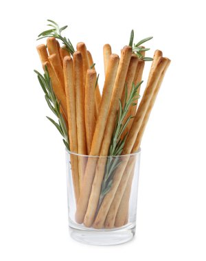 Lezzetli Grissini çubukları ve beyaz bardakta biberiye.