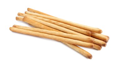 Bir sürü lezzetli Grissini çubuğu beyazda izole edilmiş