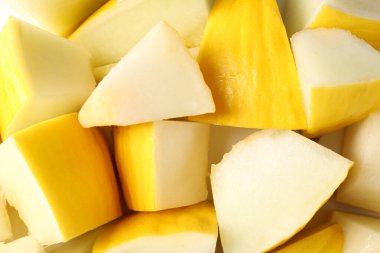 Arkaplan olarak olgun kavun parçaları, üst görünüm