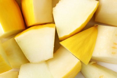 Arkaplan olarak olgun kavun parçaları, üst görünüm