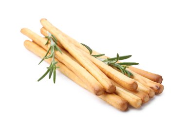 Lezzetli Grissini çubukları ve beyaz biberiye.