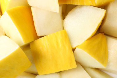 Arkaplan olarak olgun kavun parçaları, üst görünüm