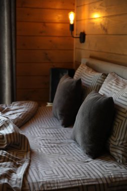 Big comfortable bed in stylish hotel room