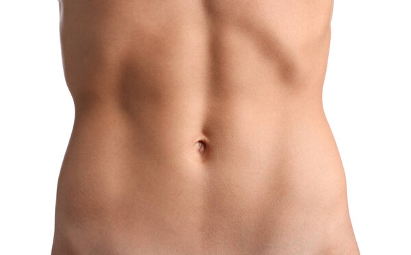 Женщина с плоским животом на белом фоне, крупным планом