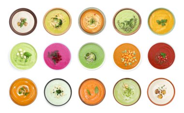 Pürüzsüz ve kadife gibi yemek dokusu. Beyaza izole edilmiş farklı krema çorbaları, set. Üst görünüm