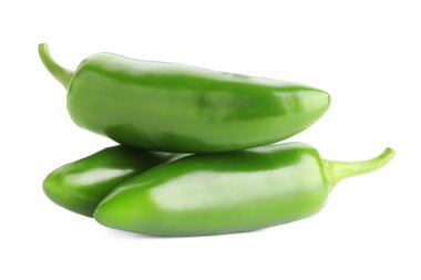 Many green jalapeno peppers isolated on white