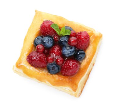 Tasty puff pastry with berries and mint isolated on white, top view