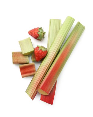 Fresh ripe rhubarb and strawberries isolated on white, top view