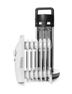 Different modern electric heaters isolated on white