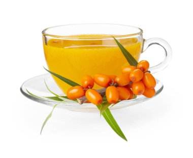 Cup of sea buckthorn tea and fresh berries isolated on white