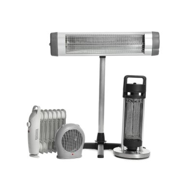 Different modern electric heaters isolated on white