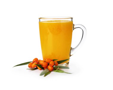 Cup of sea buckthorn tea and fresh berries isolated on white