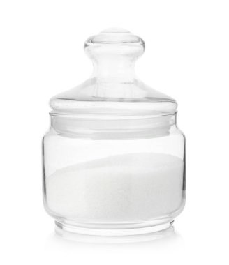 Glass jar with granulated sugar isolated on white