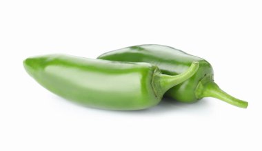 Two green jalapeno peppers isolated on white