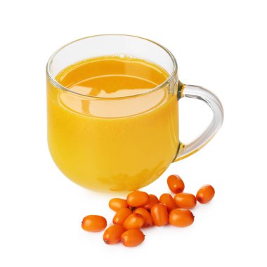 Cup of sea buckthorn tea and fresh berries isolated on white