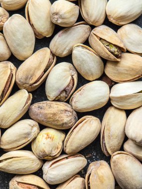 organic pistachio nuts  on the table, close up