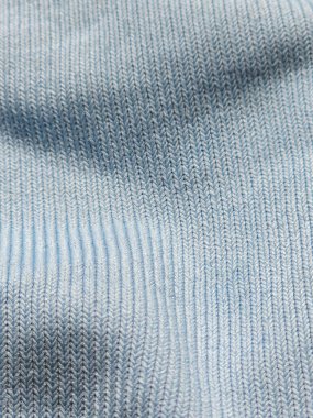 kumaş arkaplanı ve telafuz edilen doku örgü giysileri.