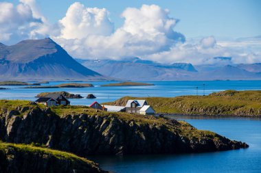 Sugandisey Cliffs, Iceland at Snaefellsnes Atlantic Ocean Sailing and Lighthouse of Island Landscape