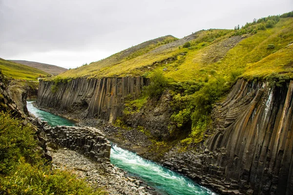 Studlafoss and Studlagil Basalt Rock Columns  Canyon Dramatic Landscape river in Jokuldalur, Iceland