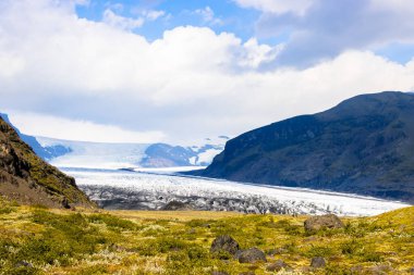 Skaftafell in  Vatnajokull National Park with Glacier Lagoons, Waterfalls, Snowy Green Mountains