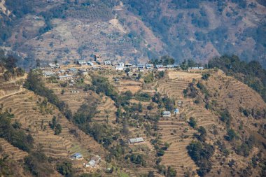 Tiny Village of Bhotechaur with HImalayas in the Background