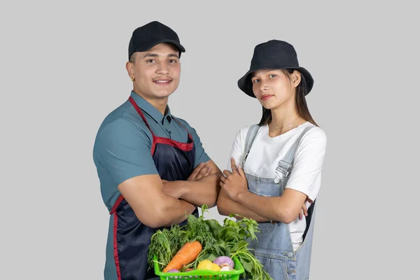 Asian Agriculture Nepali Indian Farming Couple Giving Gestures and Expressions carrying vegetable basket
