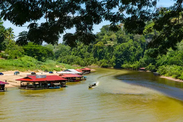 stock image Pahang, Malaysia - May 14, 2024 :  Kelatan Tahan Tembeling River with Floating Restaurants in Taman Negara National Park