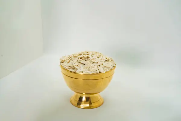 Stock image A Copper Bowl Filled with beaten Rice Flakes aka Chiura Chiuda for Paddy Plantation Day Asaar 15 Dahi Chiura Celebration in Nepal