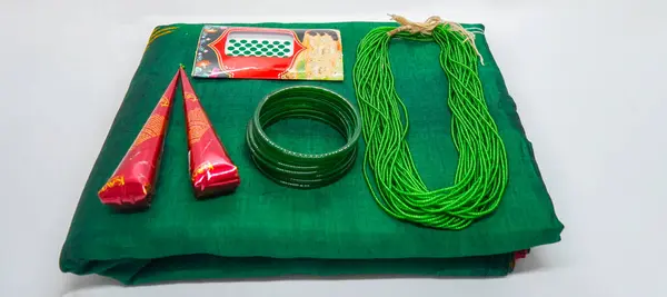 stock image Shrawan Month Green Bangles, Mehendi Cones, Tika, Hair Flowers Gajra, necklace for Hindu Festival