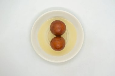 A Plate of Gulab Jamun Lal Mohan Sweets for Indian Ceremony Festival Diwali clipart