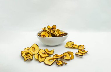 Lezzetli görünüyor Altın Kurutulmuş Elma Sağlıklı Meyve Mustang Manang Elması Kahvaltı için izole edilmiş arka plan