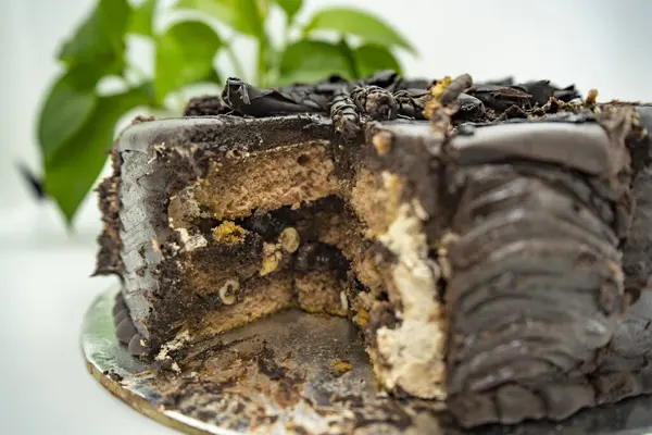 stock image Slice of a Dark Chocolate Truffle Dark Forest Brown Cake for a New Year Celebration