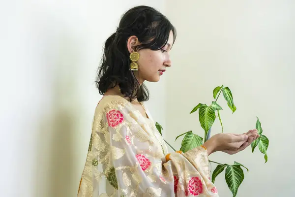 Stock image Beautiful Asian Female in Kurtha for Diwali giving Expressions & Gestures with LED Christmas Lights