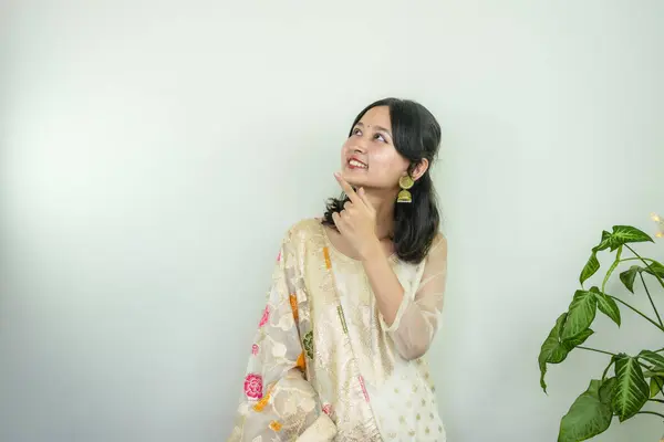 Stock image Beautiful Asian Female in Kurtha for Diwali giving Expressions & Gestures with LED Christmas Lights